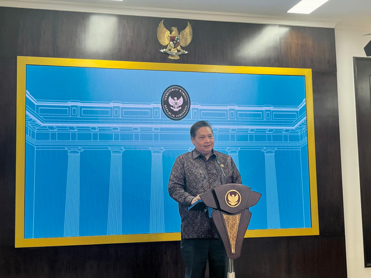 Coordinating Economic Minister Airlangga Hartarto delivers a press statement at the State Palace on April 28, 2025, after meeting President Prabowo Subianto to report on the ongoing negotiations with Washington aimed at averting steep US import tariffs to be imposed on Indonesian-made goods.