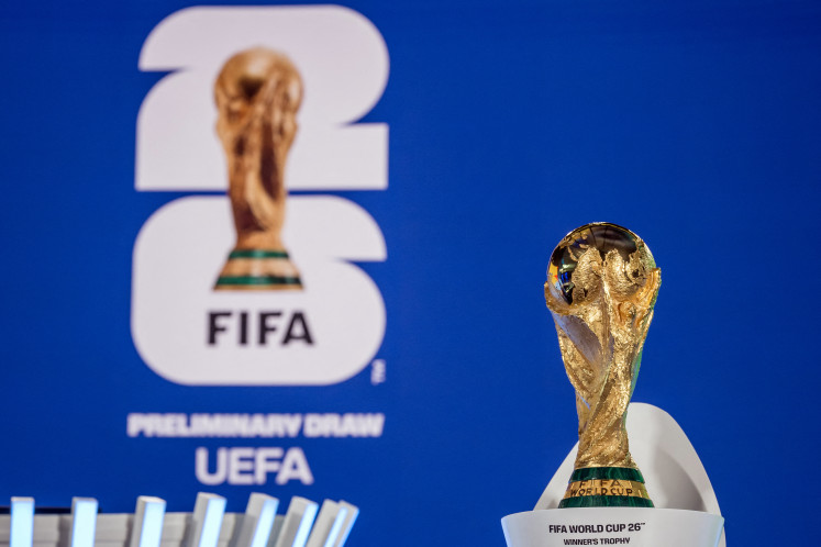 The FIFA World Cup trophy is displayed ahead of the draw for the 2026 FIFA World Cup European qualifiers at the FIFA headquarters in Zurich, on December 13, 2024.